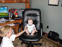 Zack in office chair with Shelly